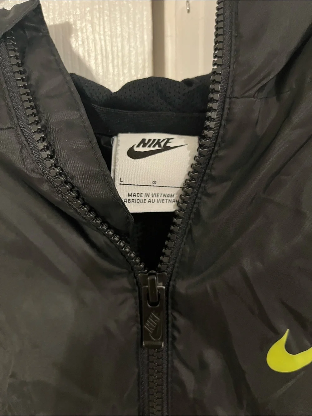 Nike Kids Black Windbreaker with Neon Yellow, Teal & Red Geo Print